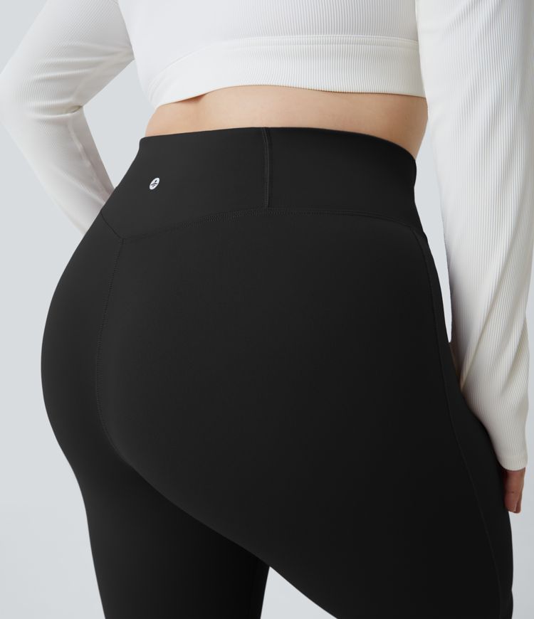 Leggings súper acampanados de tiro alto con cintura cruzada y bolsillo trasero en tallas grandes