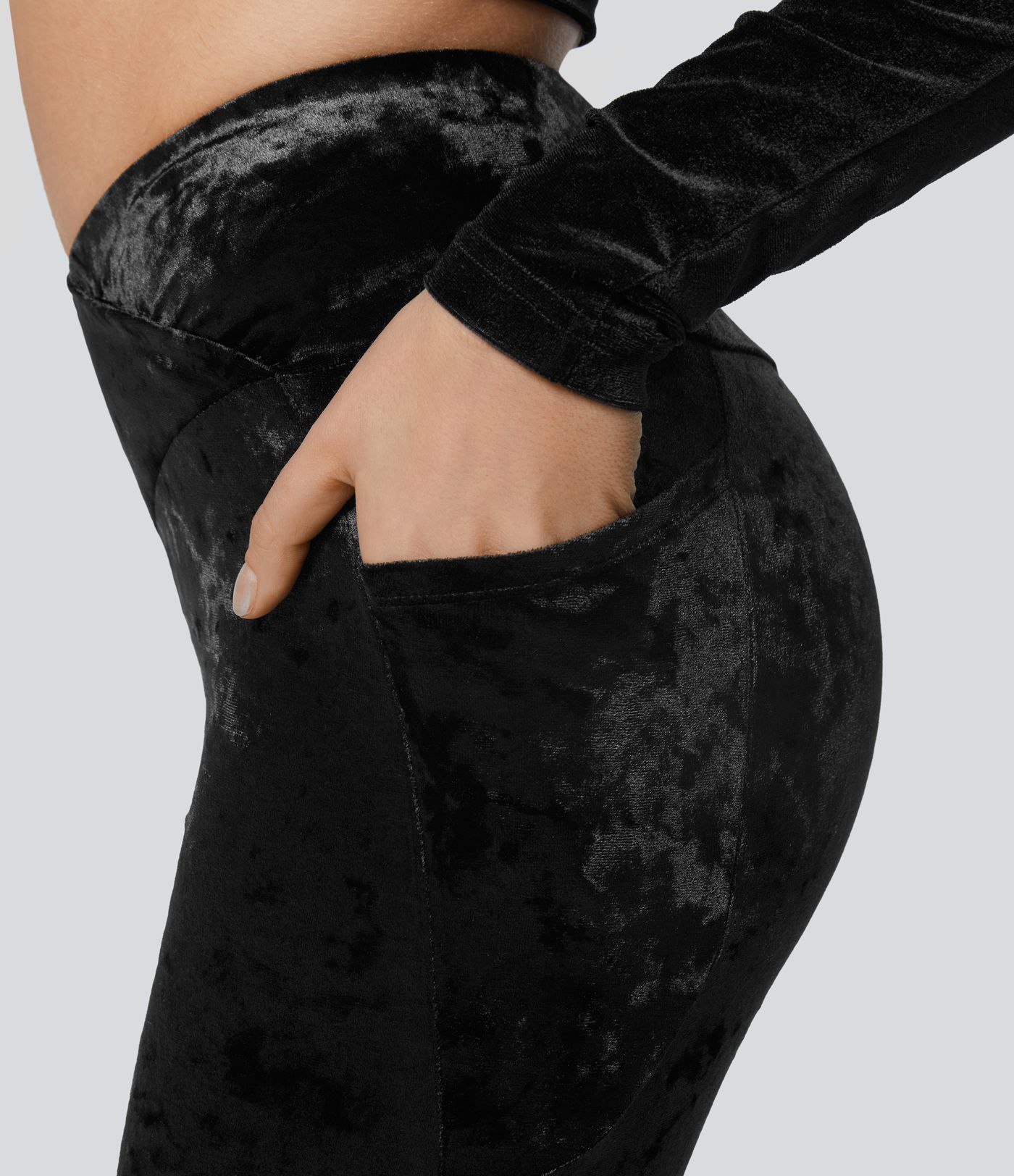 Leggings de terciopelo de tiro alto con cintura cruzada y bolsillos