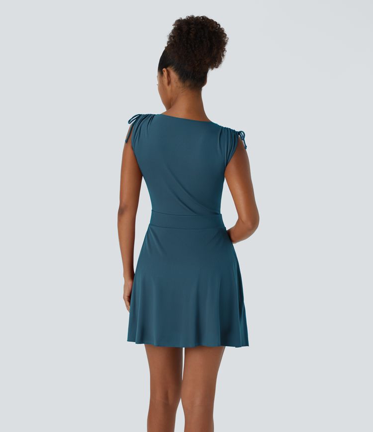 Vestido deportivo 2-en-1 con bolsillos laterales con cordones - con top turbo separado