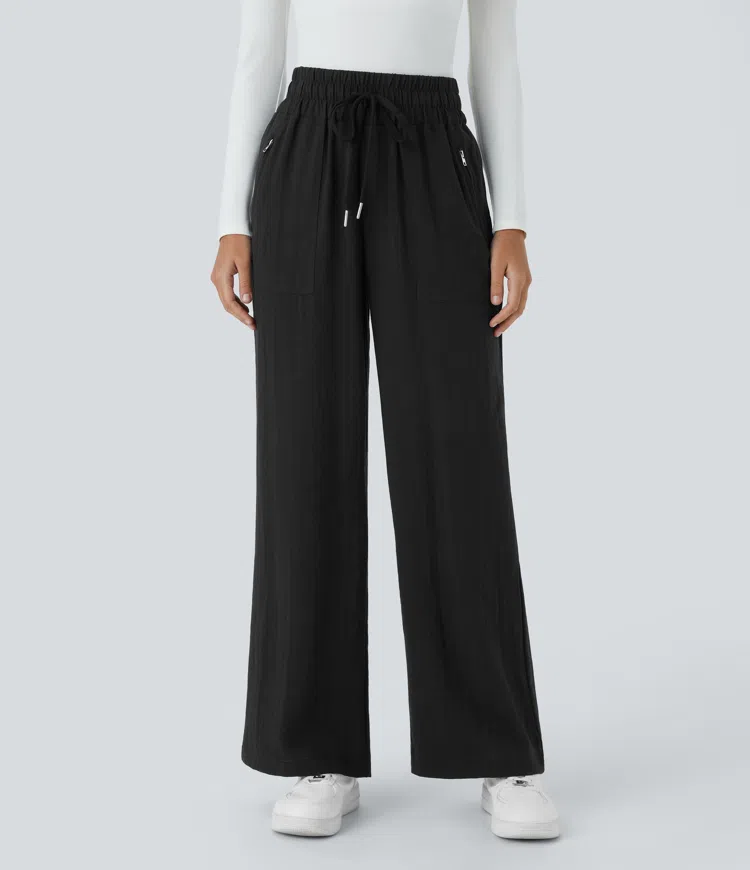 Pantalón tiro alto cordón bolsillo cremallera lateral pierna ancha