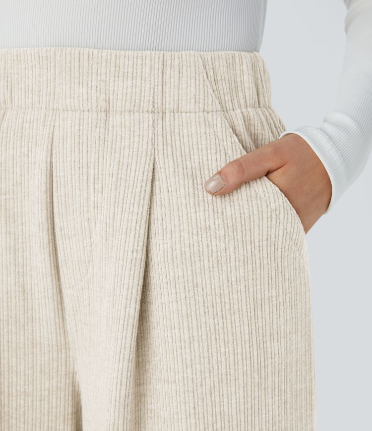 Pantalón pierna ancha bolsillo lateral plisado tiro alto canalé