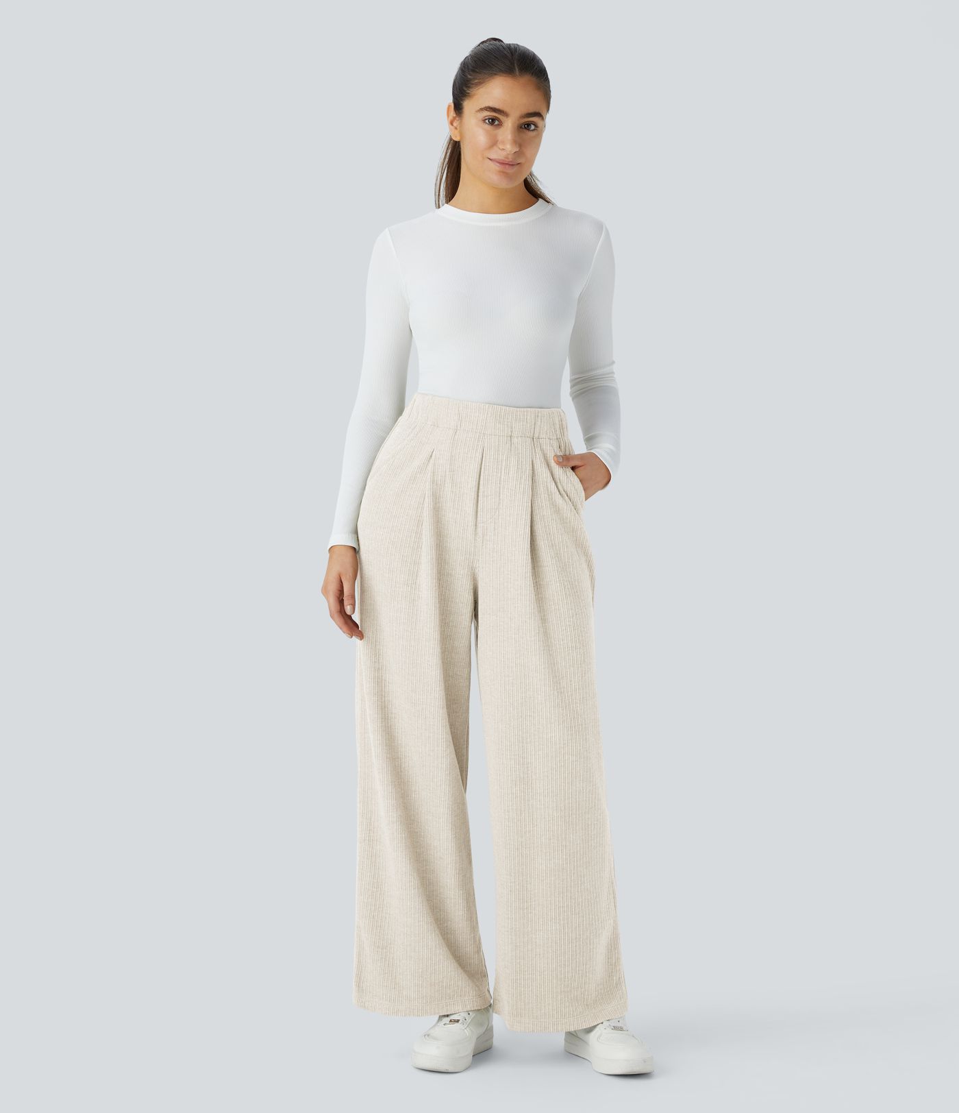 Pantalón pierna ancha bolsillo lateral plisado tiro alto canalé