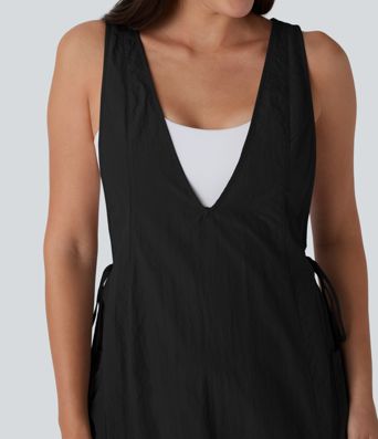 Volný overal s výstřihem do V bez rukávů se stahovací šňůrkou a kapsami