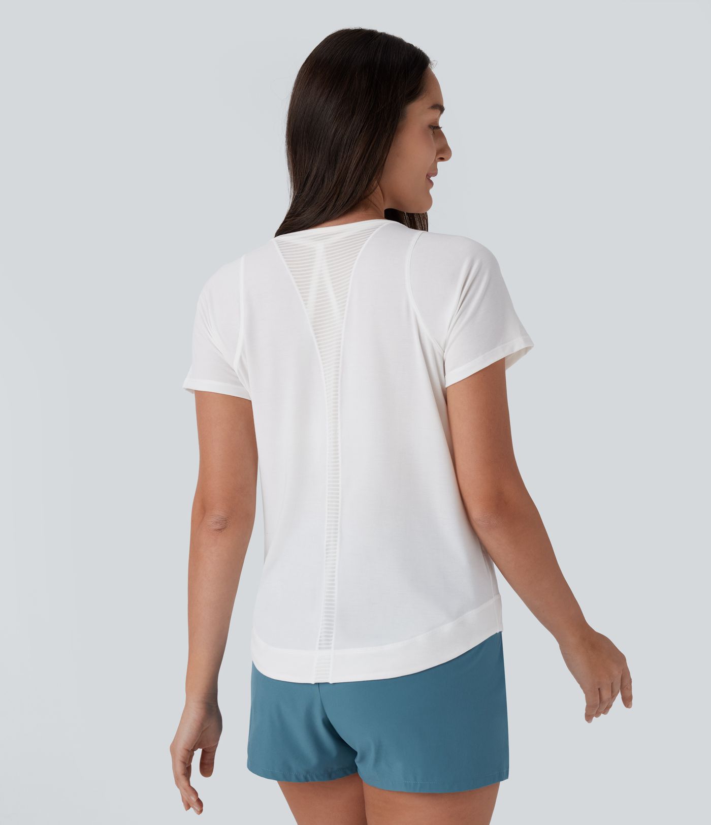 Haut de sport pour course à pied à col rond, manches courtes et ourlet arrondi à séchage rapide