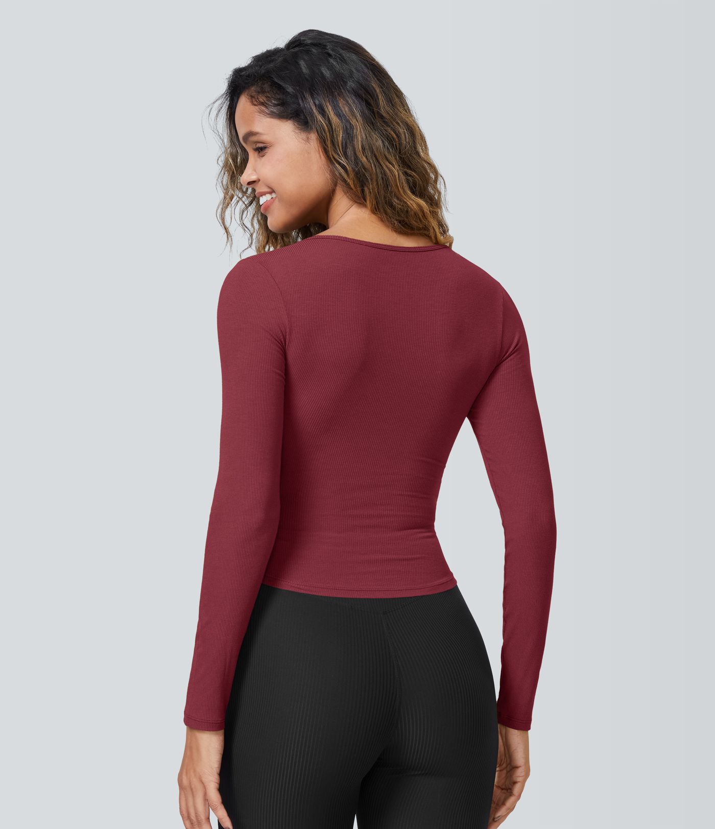 Top deportivo cortado cruzado de punto acanalado de manga larga con escote cuadrado