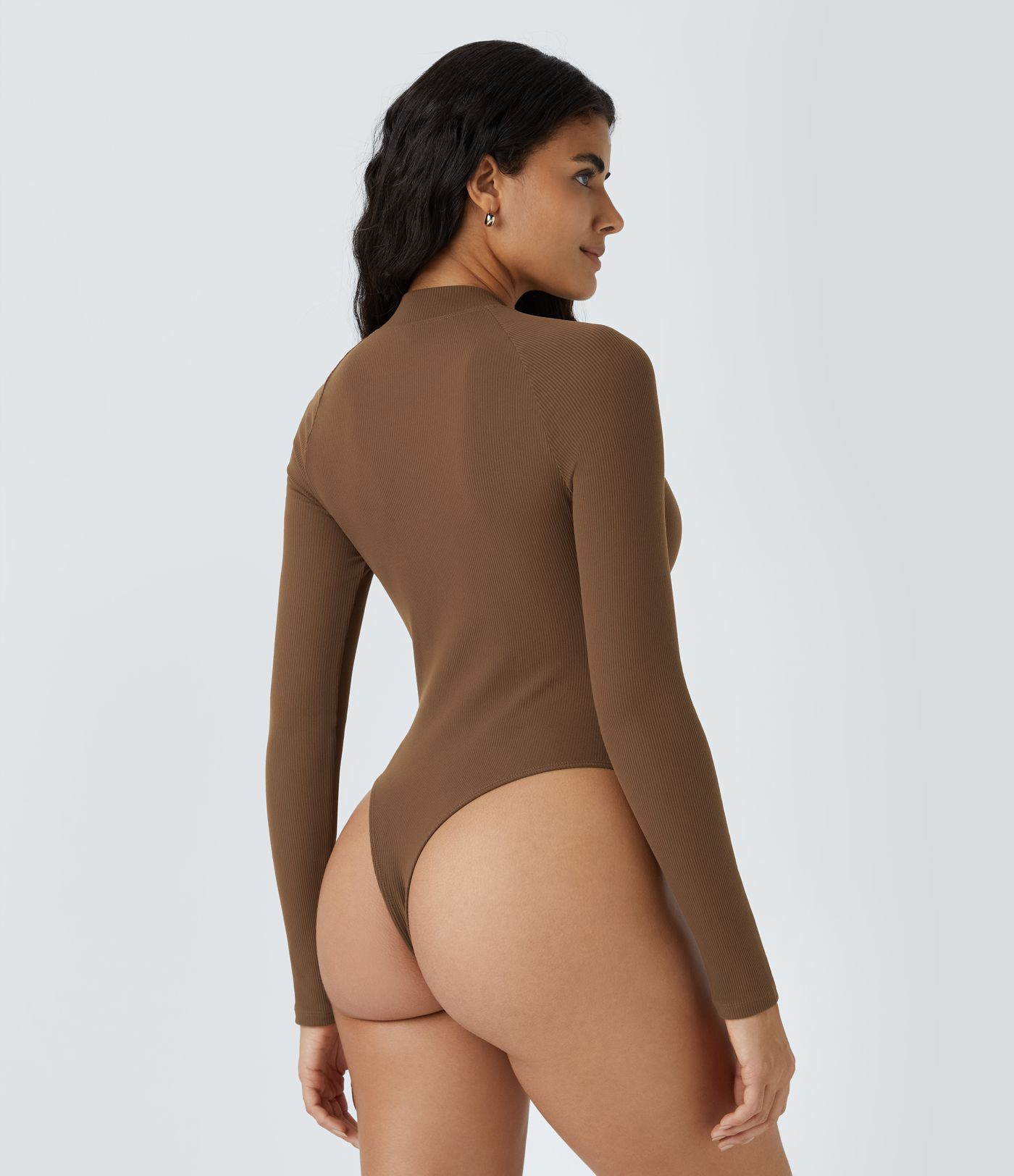 Softlyzero™ relaxed ribbed bodysuit with high neck, long raglan sleeves, and slim fit