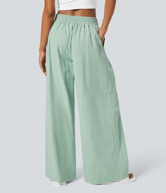 Lässige Baumwollhose mit hoher Taille und Knopfseitentaschen und weitem Bein
