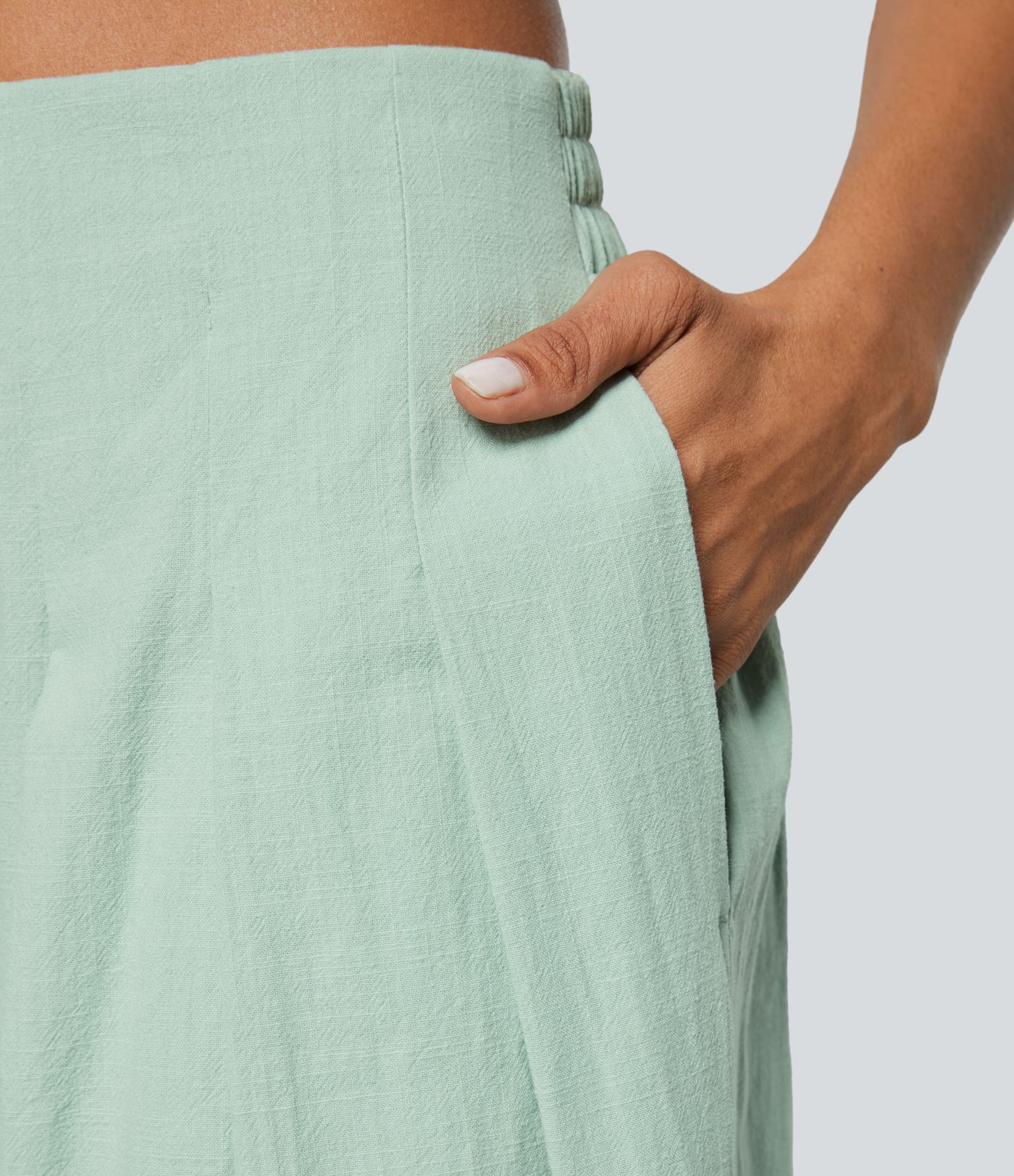 Lässige Baumwollhose mit hoher Taille und Knopfseitentaschen und weitem Bein