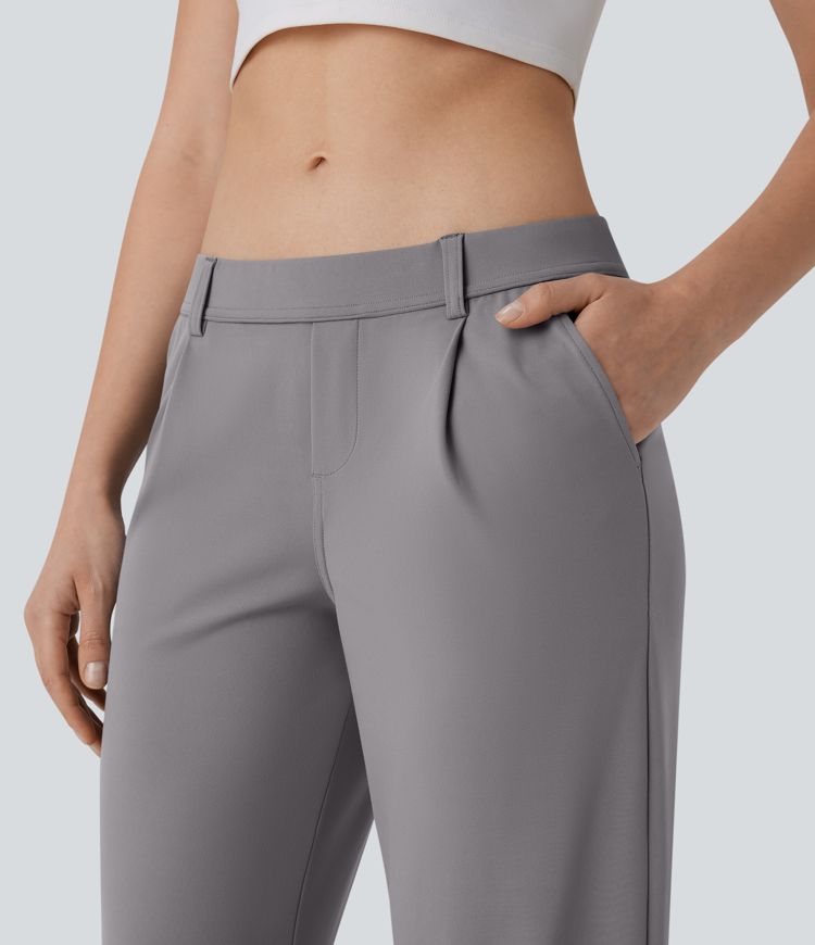 Pantalón corte acampanado bolsillo lateral tiro bajo