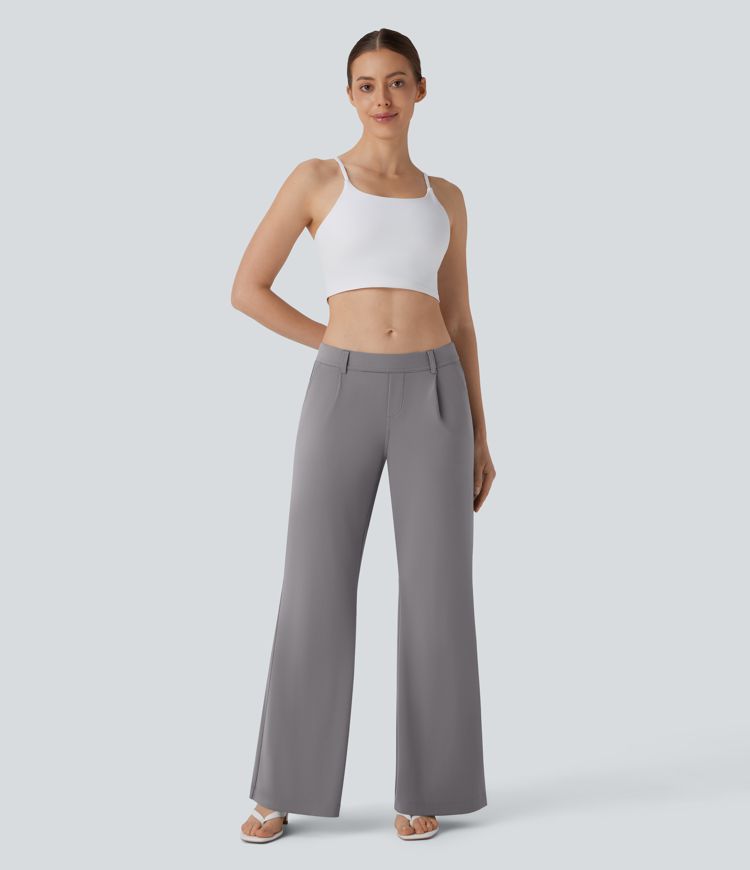 Pantalón corte acampanado bolsillo lateral tiro bajo