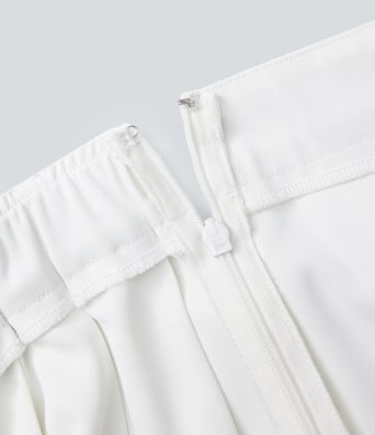 Jupe courte plissée asymétrique avec ceinture à taille moyenne