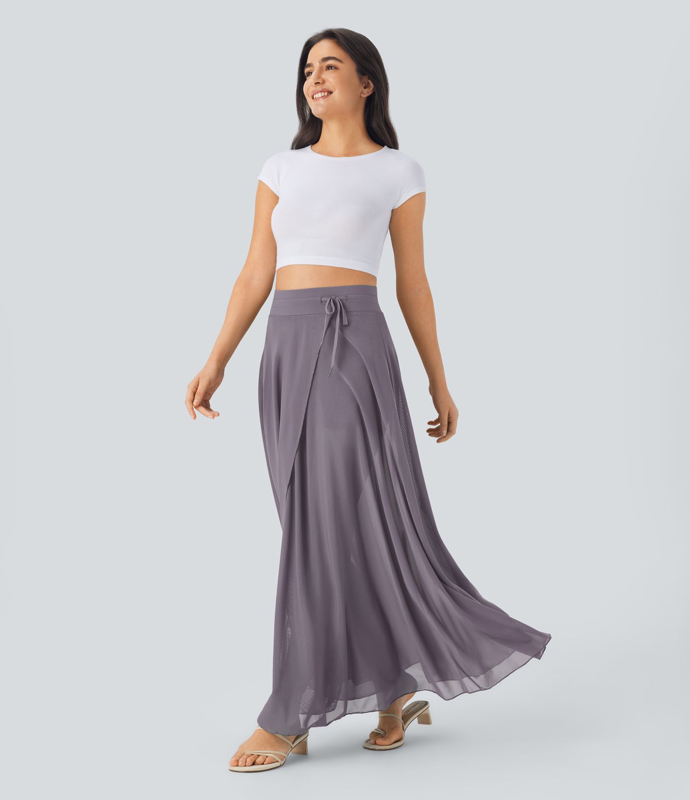 Fließender 2-in-1 Maxi-Flare-Freizeitrock mit hohem Bund, Seitentaschen und kontrastierendem Netzstoff Fließender 2-in-1 Maxi-Flare-Freizeitrock mit hohem Bund, Seitentaschen und kontrastierendem Netzstoff