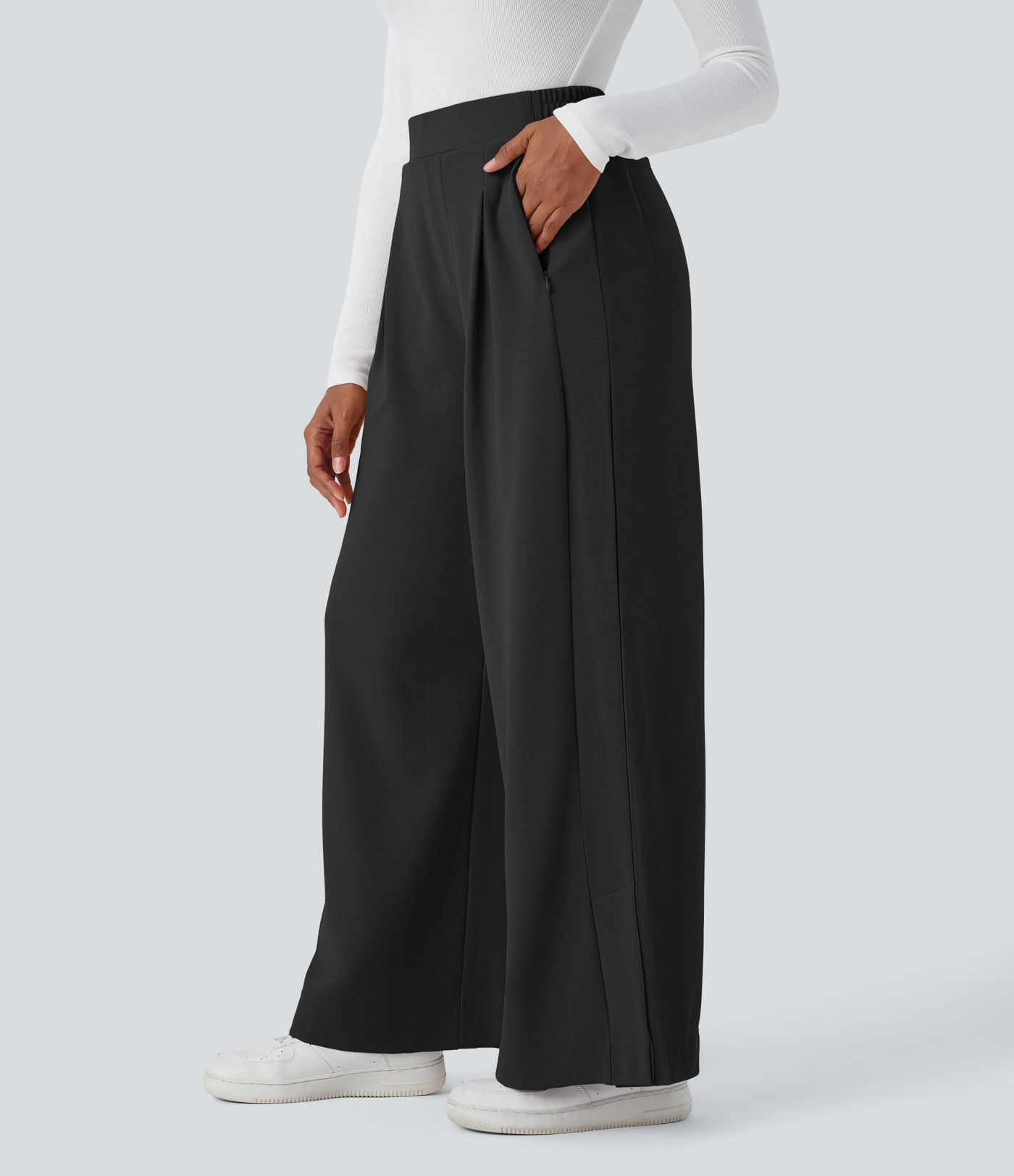 Pantalón gofre pierna ancha abertura bolsillo lateral cremallera plisada tiro alto