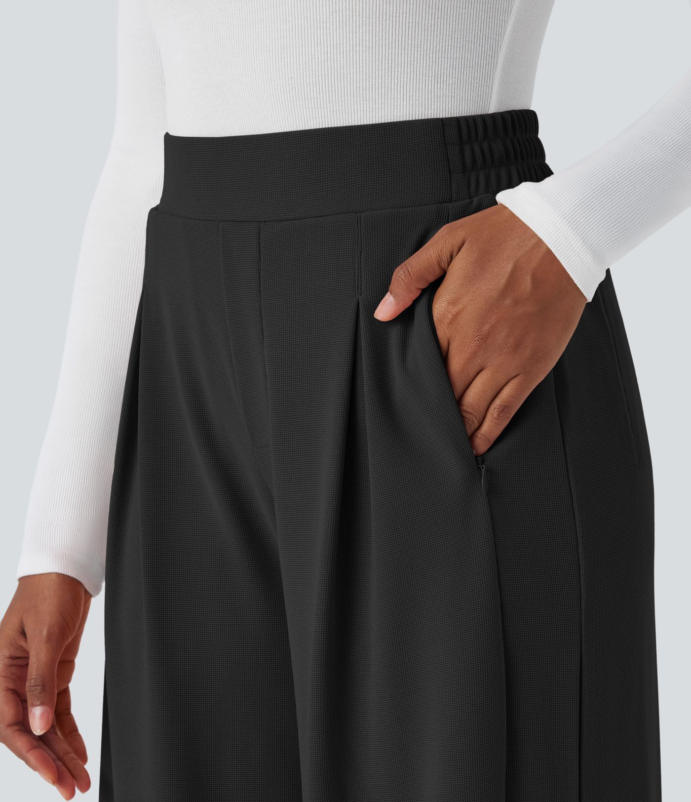 Pantalón gofre pierna ancha abertura bolsillo lateral cremallera plisada tiro alto