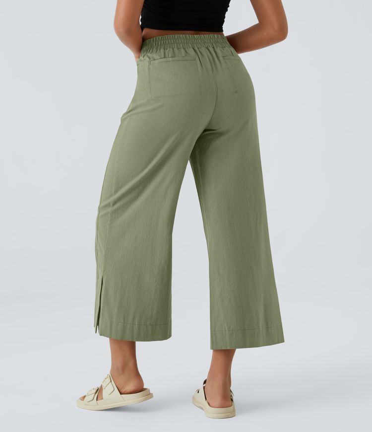 Pantalon palazzo 7/8 taille haute à plis, poches multiples et fentes latérales, aspect lin