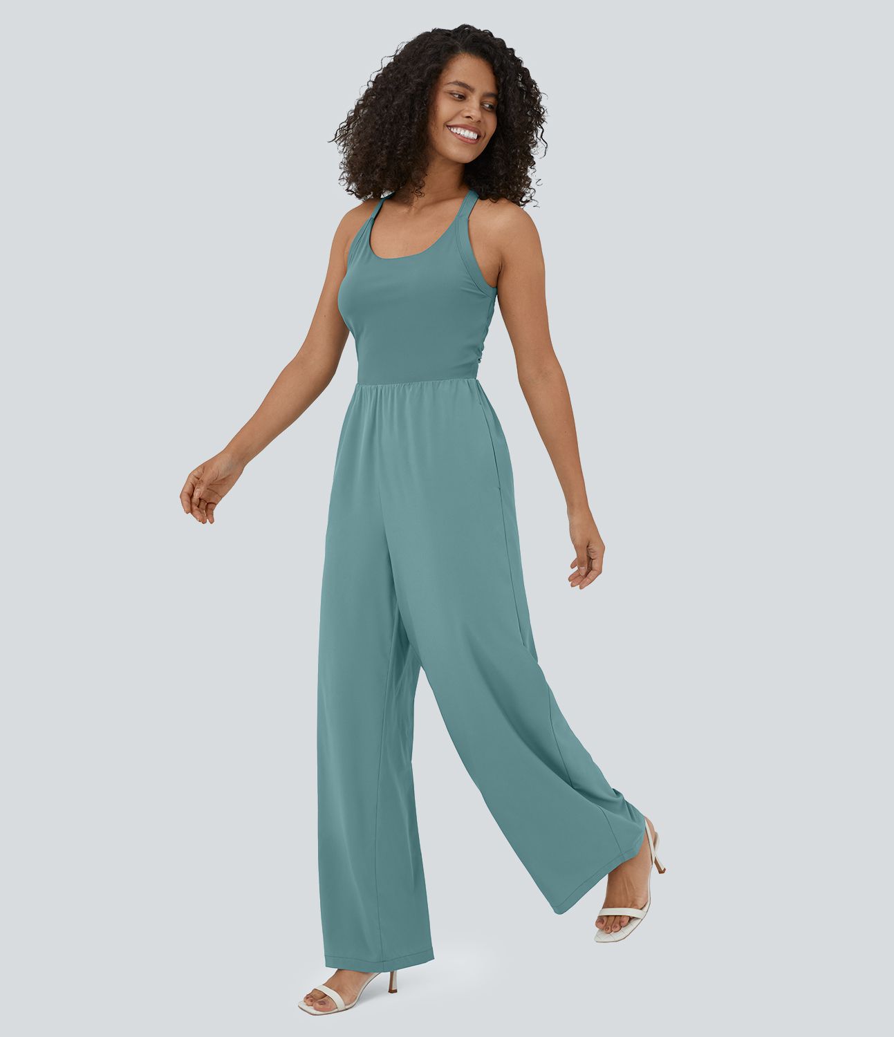 Mono Breezeful™ yoga secado rápido fluido bolsillo lateral sin mangas retorcido cut out sin espalda