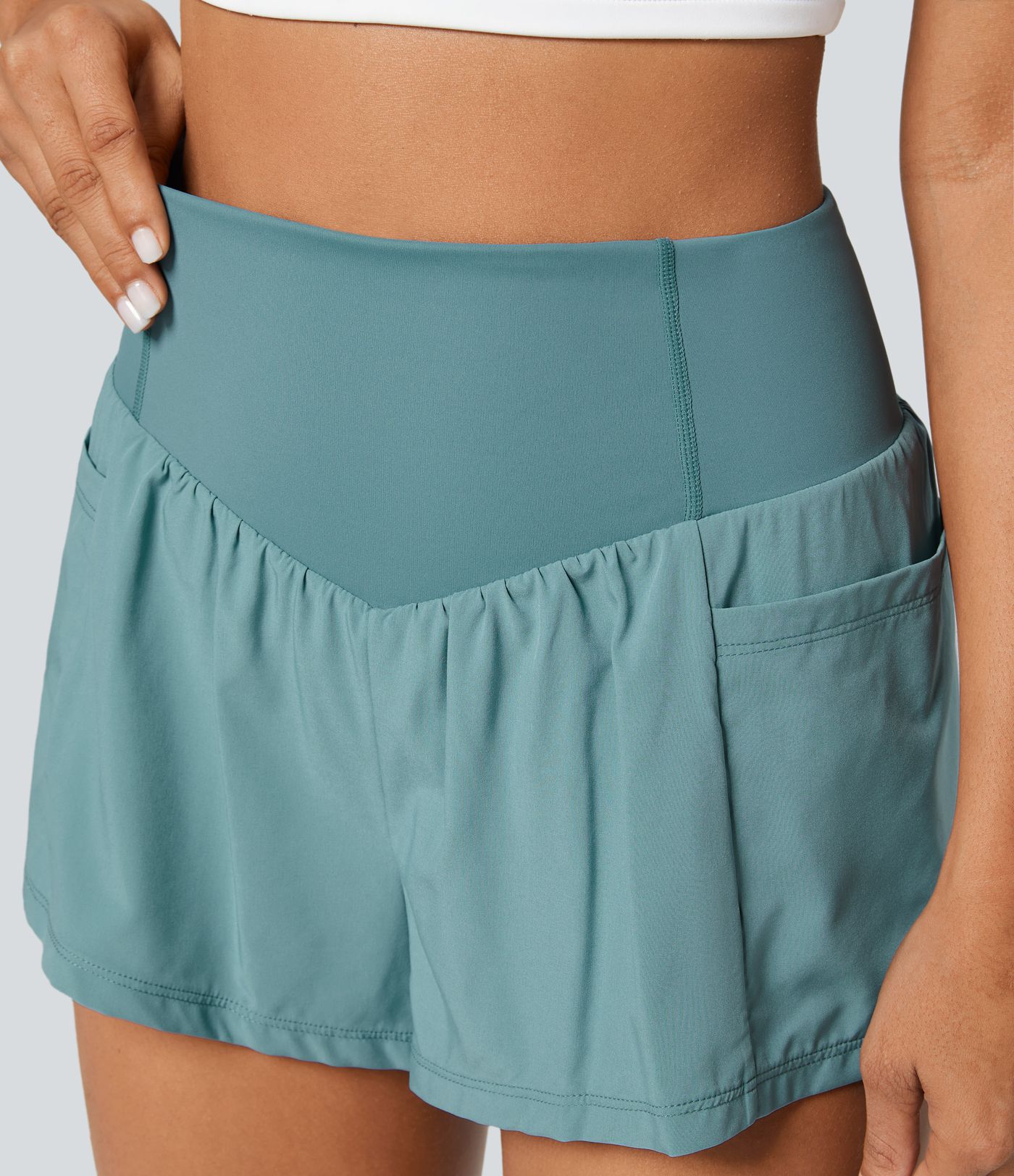 Short 2-en-1 de yoga gainant taille haute avec poches