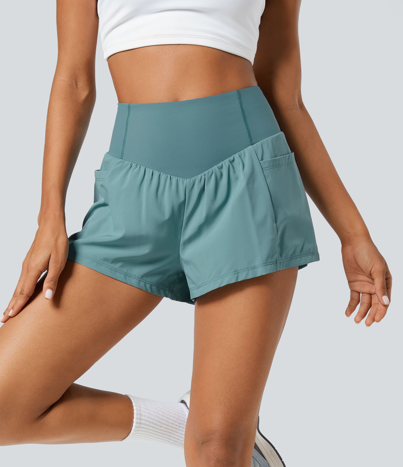Short 2-en-1 de yoga gainant taille haute avec poches