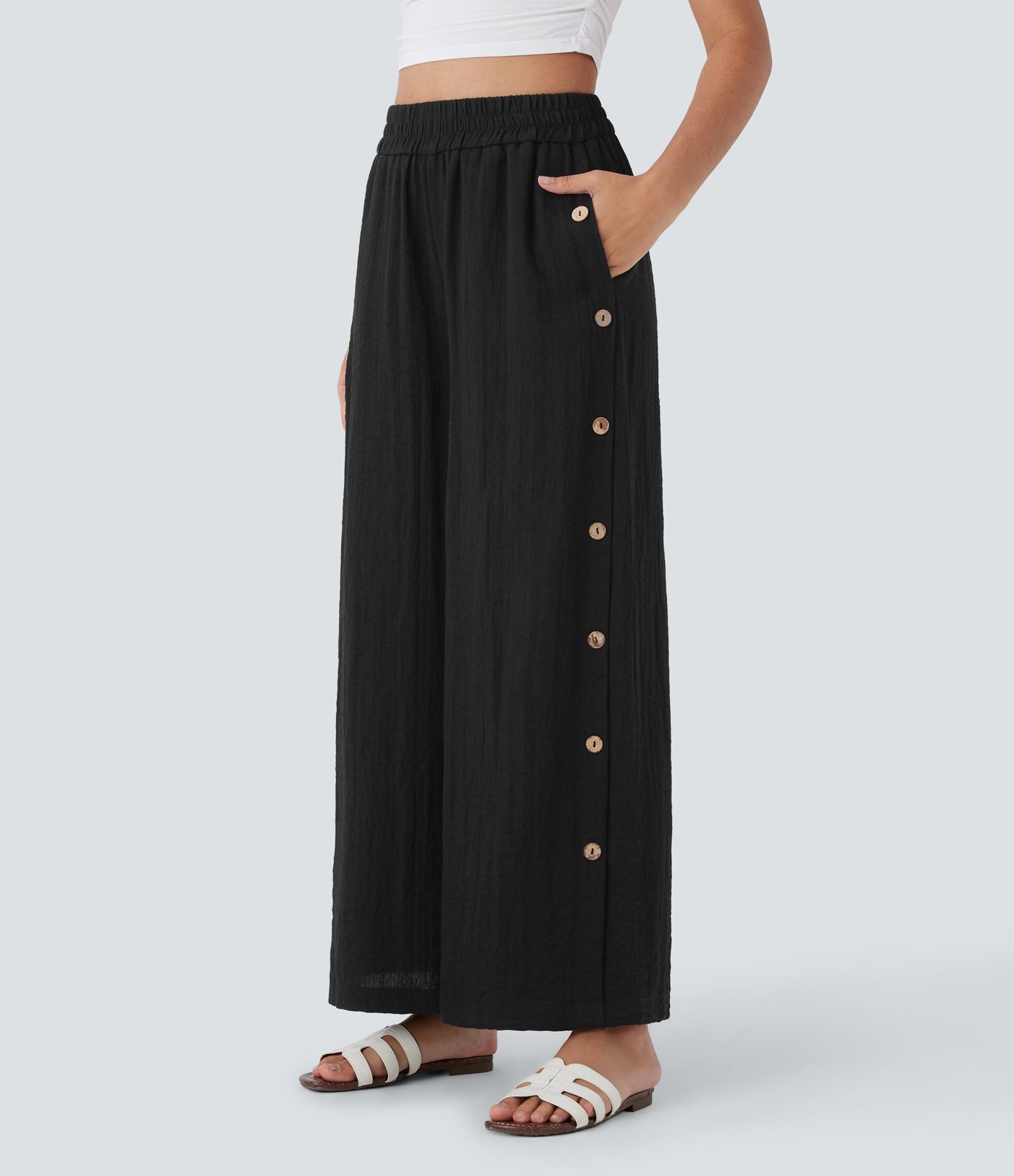 Lässige 7/8-Hose mit weitem Bein und hoher Taille, Seitentaschen und dekorativen Knöpfen