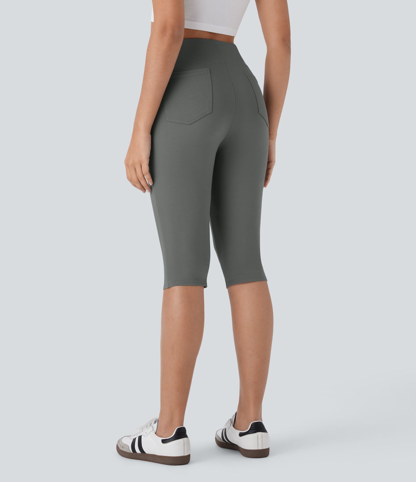 Pantalones pirata casuales de tiro alto con bolsillos