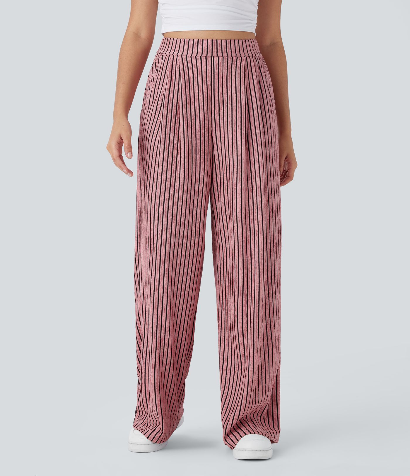 Lässige, gestreifte Hose mit hohem Bund, Seitentaschen und weitem Bein