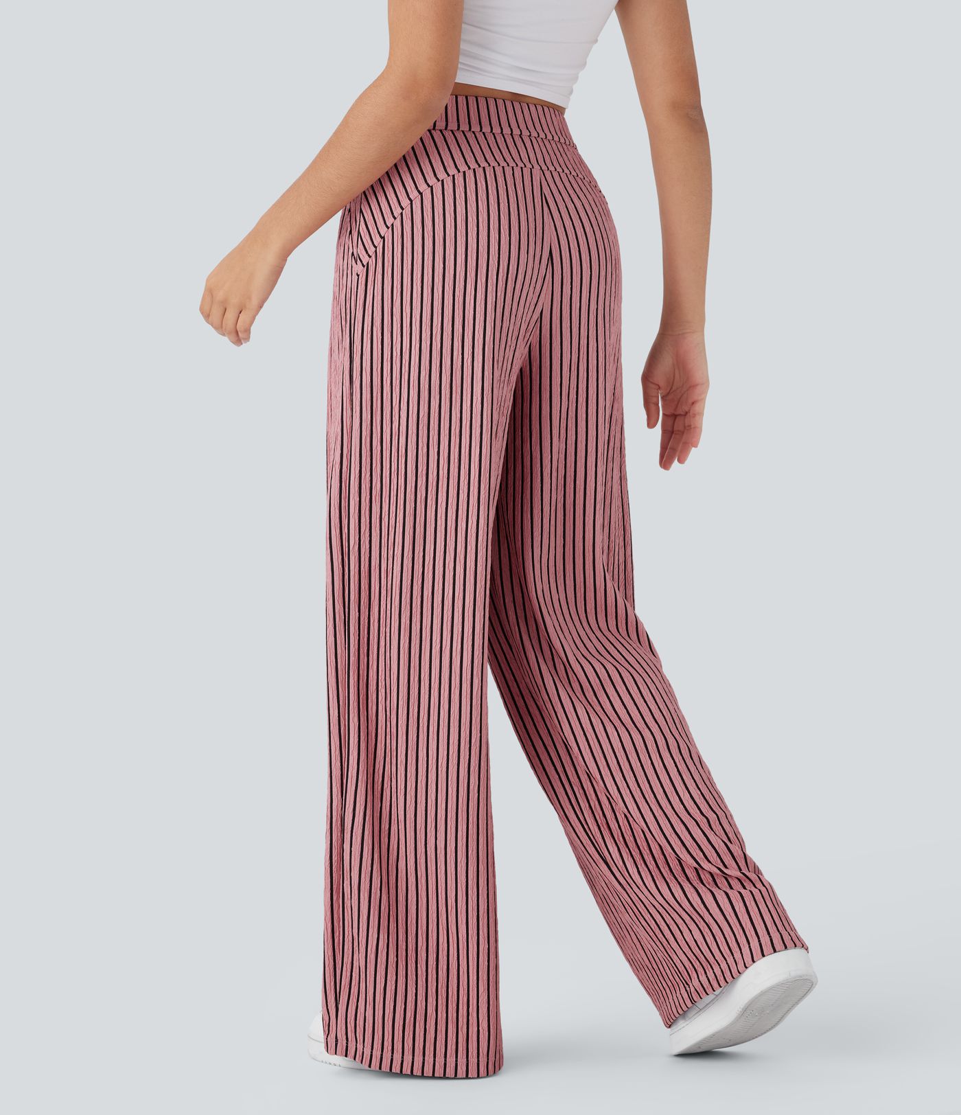 Lässige, gestreifte Hose mit hohem Bund, Seitentaschen und weitem Bein