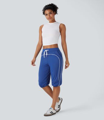 Pantalones deportivos capri Softlyzero™ Airy UPF50+ de tiro medio con cordón, bolsillos laterales y líneas en contraste con tejido fresco al tacto