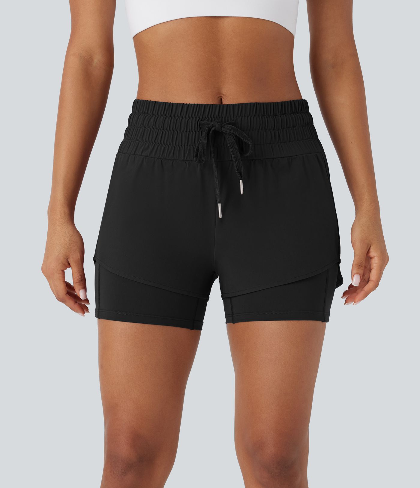 Pantalón corto Breezeful™ correr tiro medio cordón múltiple bolsillo 2 en 1 dobladillo curvo secado rápido