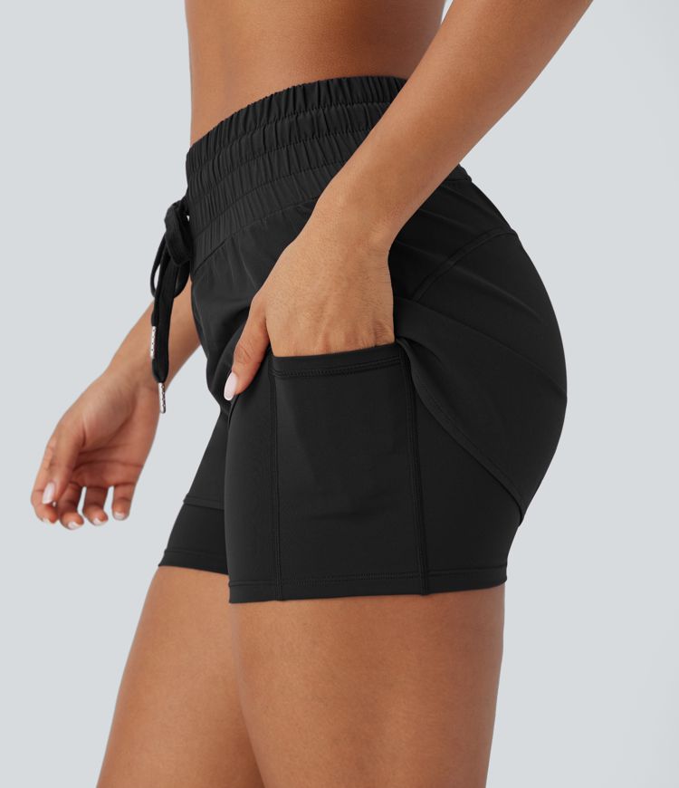 Pantalón corto Breezeful™ correr tiro medio cordón múltiple bolsillo 2 en 1 dobladillo curvo secado rápido