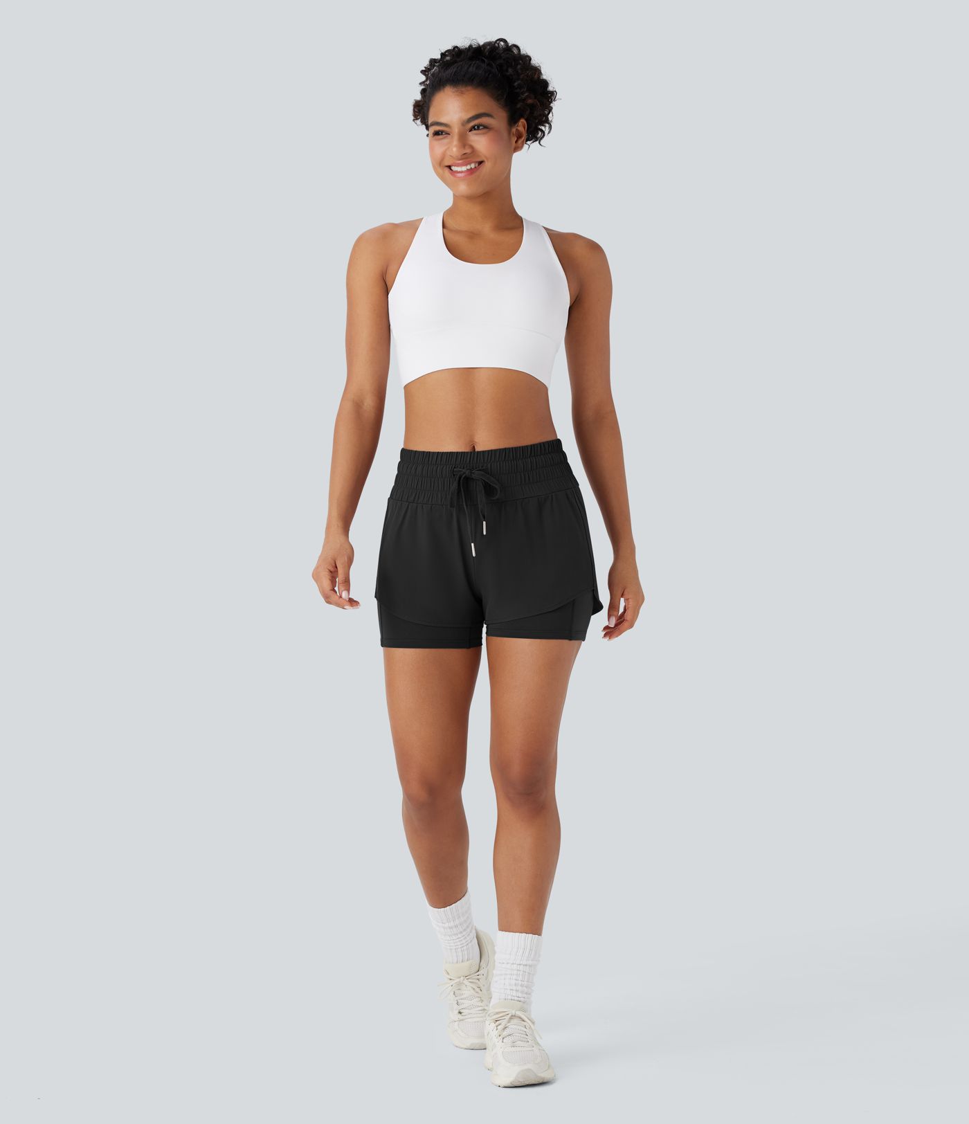 Pantalón corto Breezeful™ correr tiro medio cordón múltiple bolsillo 2 en 1 dobladillo curvo secado rápido