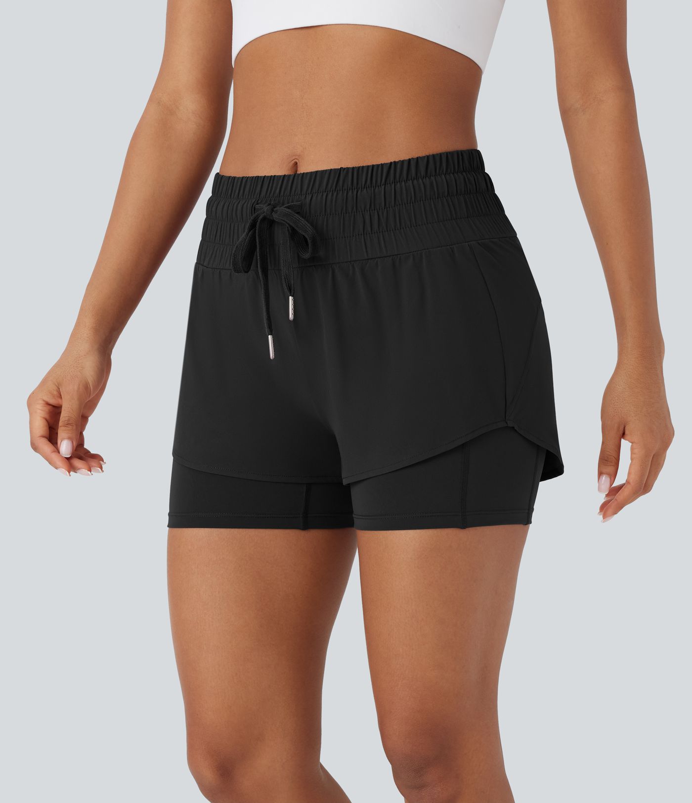 Pantalón corto Breezeful™ correr tiro medio cordón múltiple bolsillo 2 en 1 dobladillo curvo secado rápido