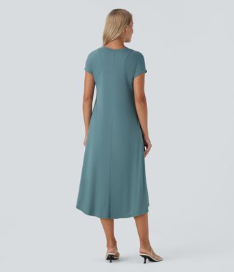 Vestido midi fluido cuello redondo manga corta bolsillo lateral