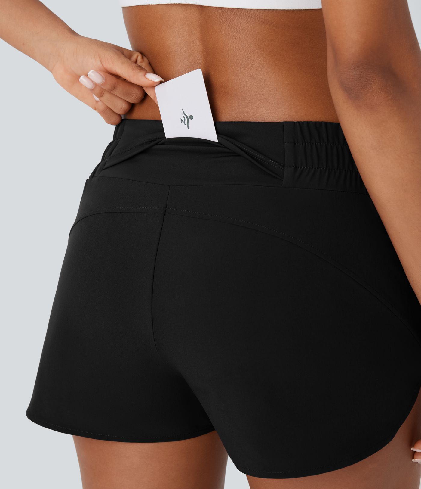 Pantalón corto Breezeful™ correr tiro bajo múltiple bolsillo 2 en 1 dobladillo curvo secado rápido 6.3cm