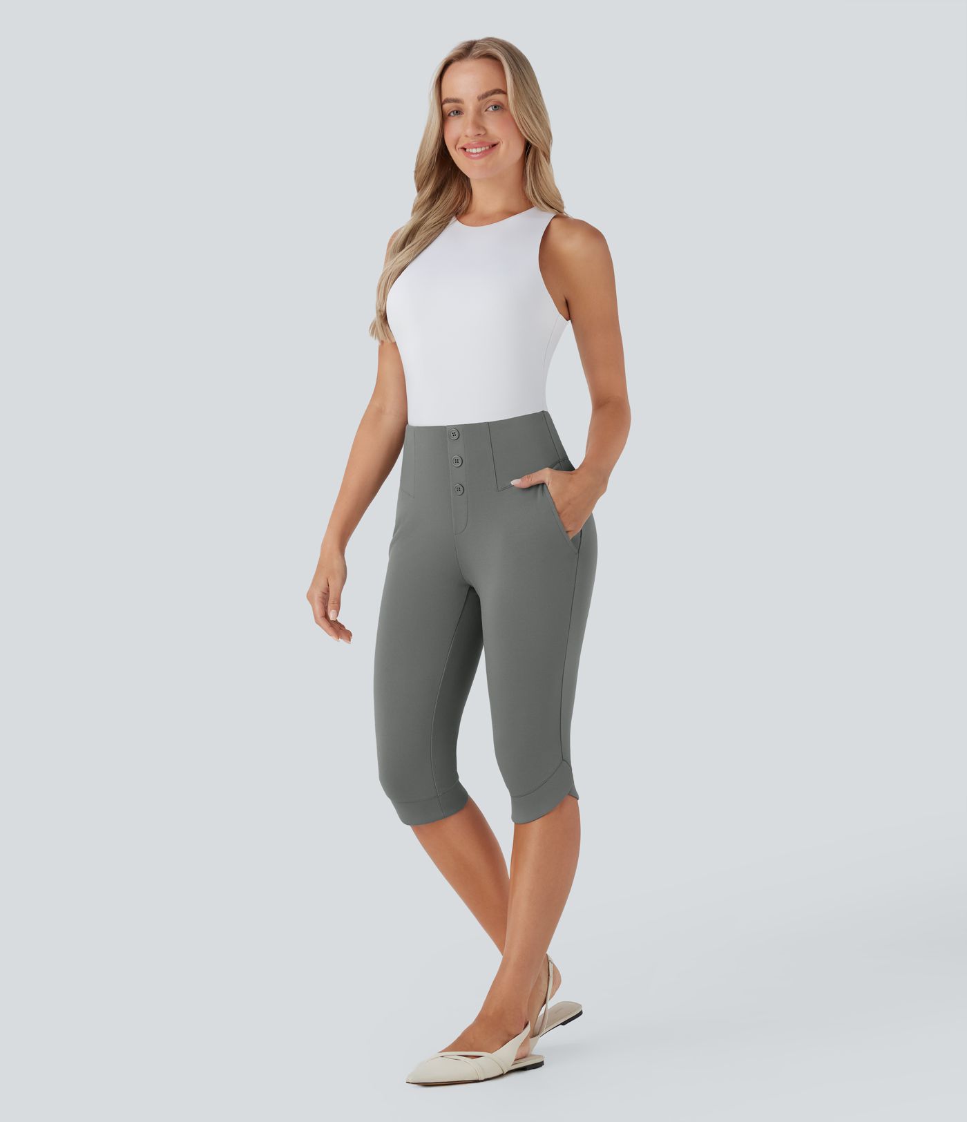 SculptKnit - Schmale Pedal-Pusher-Hose mit hohem Crossover-Bund, dekorativen Taschen und Reißverschluss