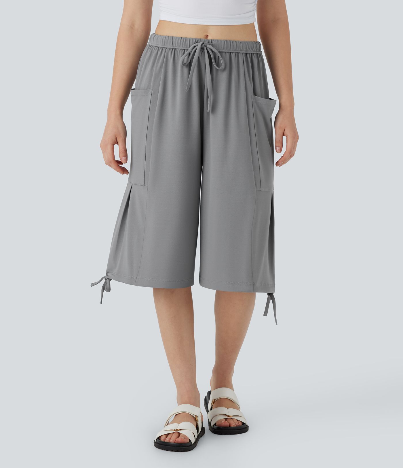 Lässige, fließende Pedal-Pusher-Palazzohose mit mittelhohem Bund, Seitentaschen, Kordelzug und weitem Bein