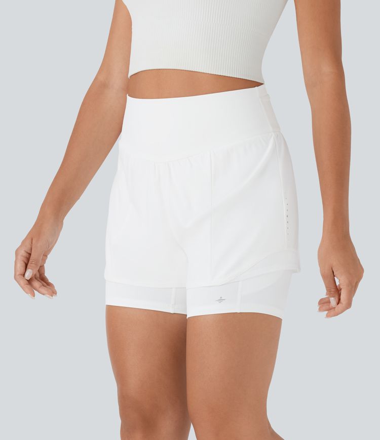 Short 2-en-1 de course gainant taille haute réfléchissant avec empiècements résille contrastés et séchage rapide avec poches SpeedWave™