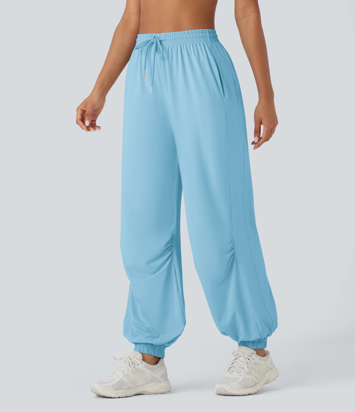 Joggers deportivo tiro alto cordón ajustable bolsillo lateral tacto fresco - UPF50+
