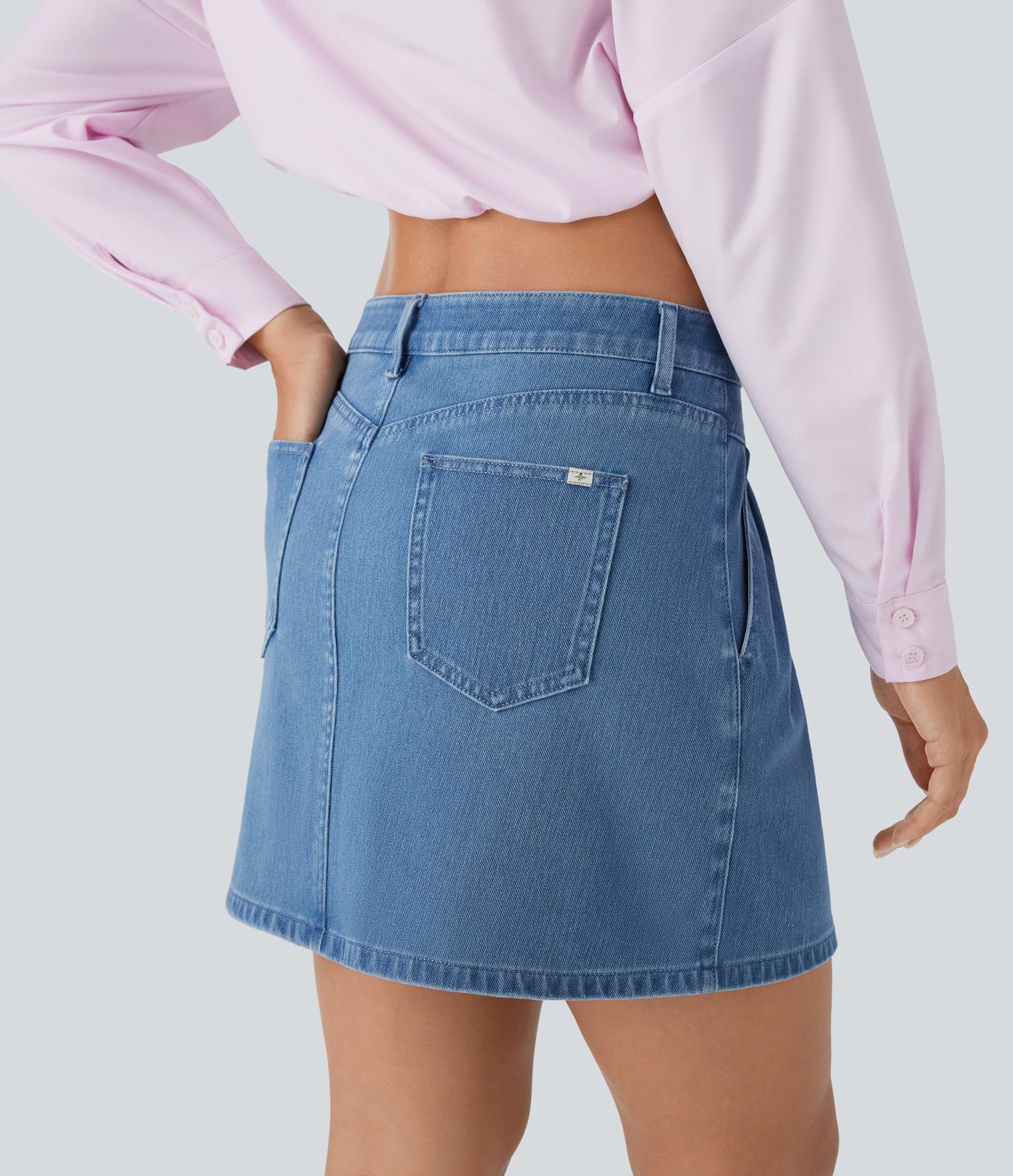 Halara Flex™ Mid Rise Knopf-Reißverschluss A-Linie Stretch-Strick-Jeans-Mini-Freizeitrock mit mehreren Taschen
