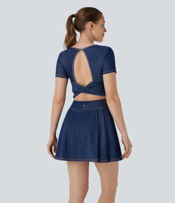 Halara Flex™ Backless, twisted, pleated 2-in-1 tennis active dress made from washed, stretchy knit denim with pockets