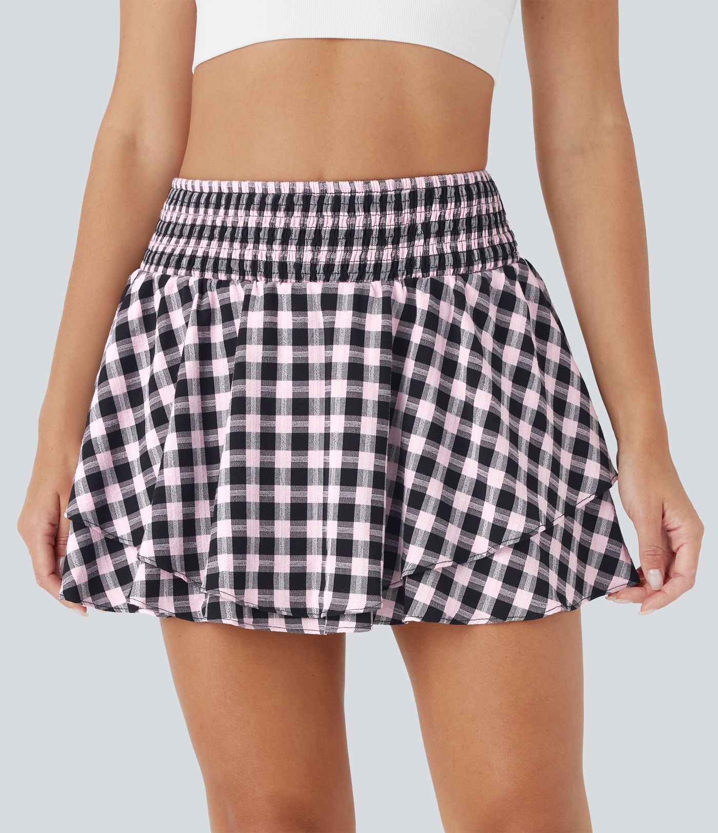 Jupe mini à carreaux plissée taille haute 2-en-1 avec poche latérale