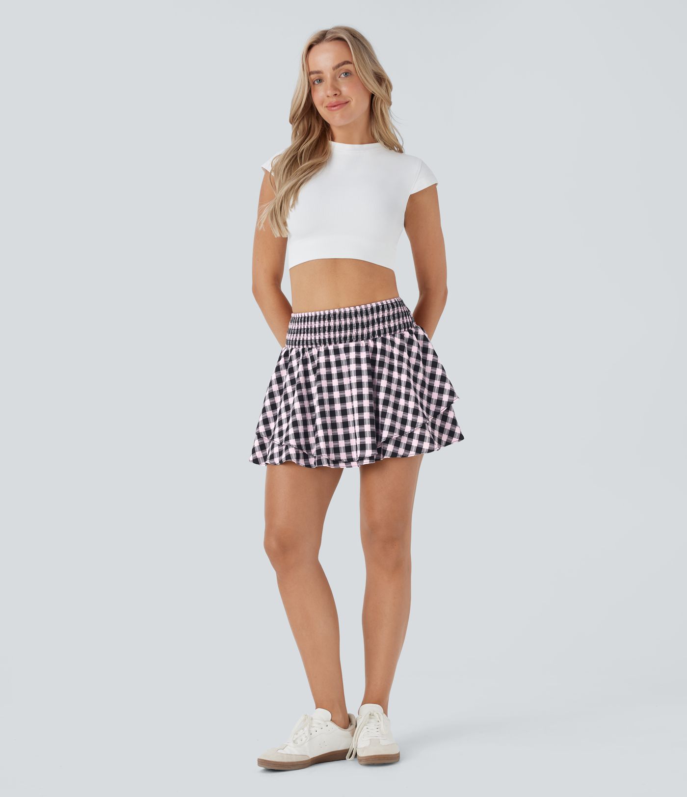 Jupe mini à carreaux plissée taille haute 2-en-1 avec poche latérale