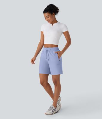 Pantalones cortos de senderismo impermeables y resistentes, de tiro medio con cordón ajustable y múltiples bolsillos con cremallera.