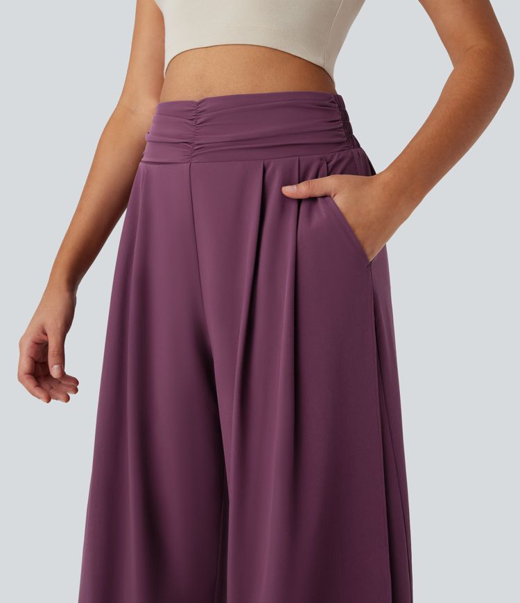 Pantalones Breezeful™ de tiro alto fruncido con bolsillos laterales, aberturas y de secado rápido