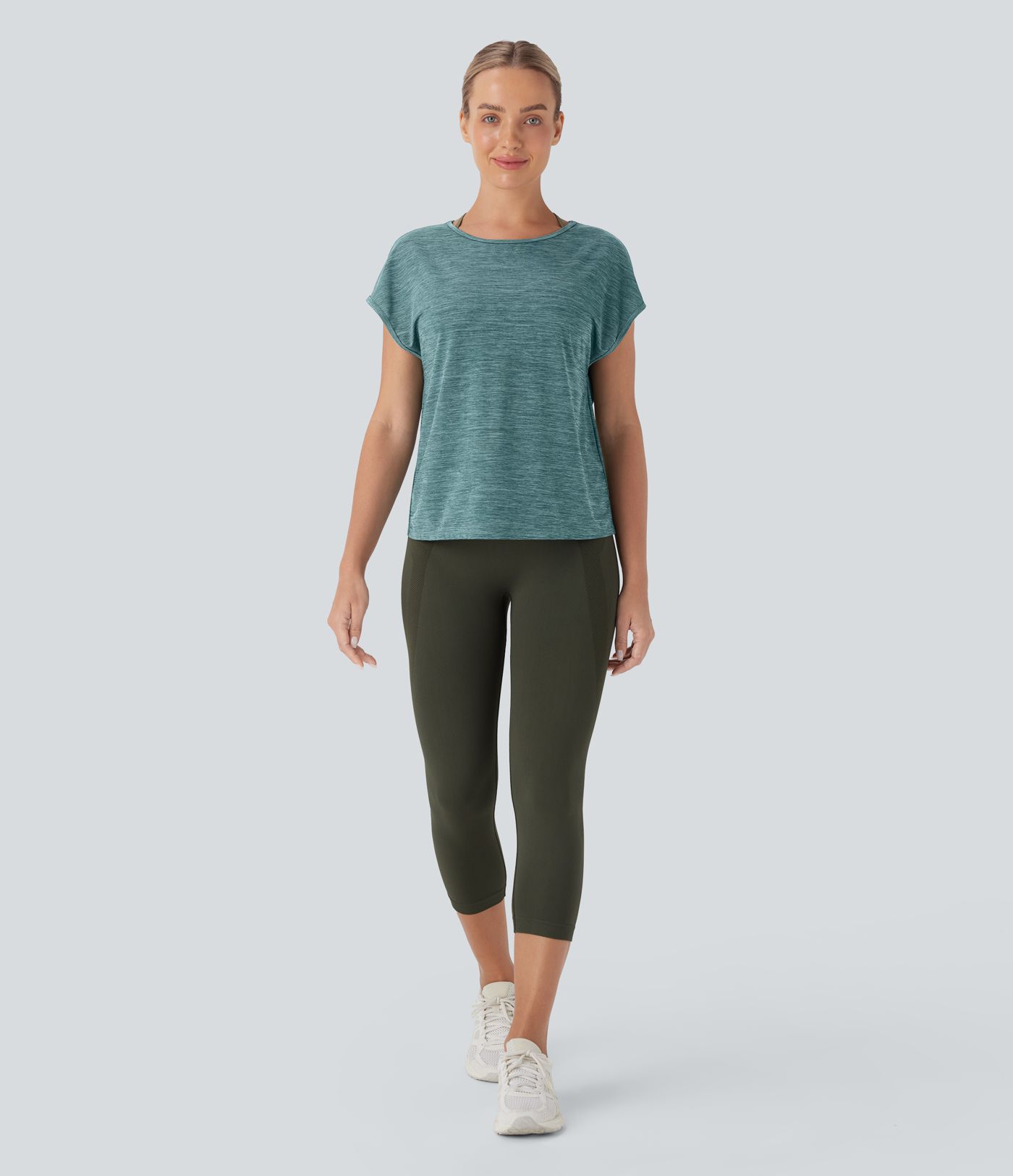 Haut de sport running col rond à manches courtes avec découpe