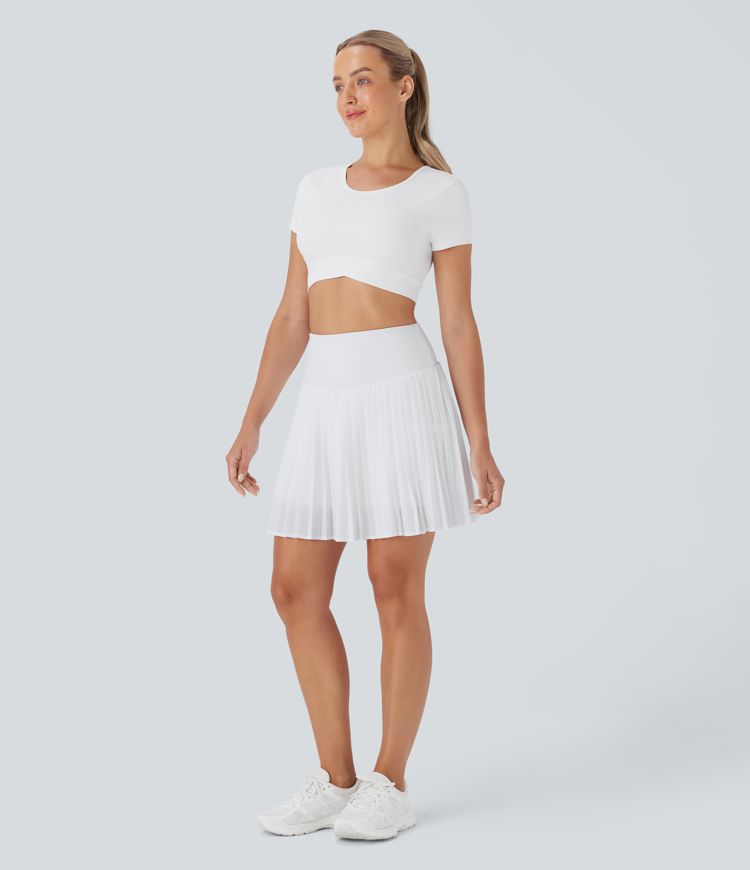 Falda de tenis corta Breezeful™ SoCinched de cintura alta con control de abdomen, pliegues y bolsillos, de secado rápido 2 en 1