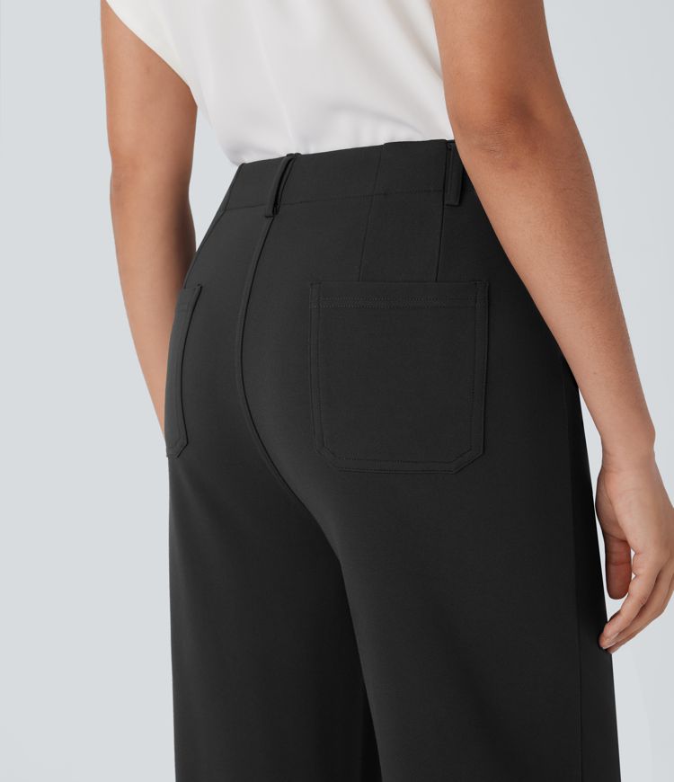 Stoffhose mit hohem Bund, mehreren Taschen, Knopf, Reißverschluss und weitem Bein