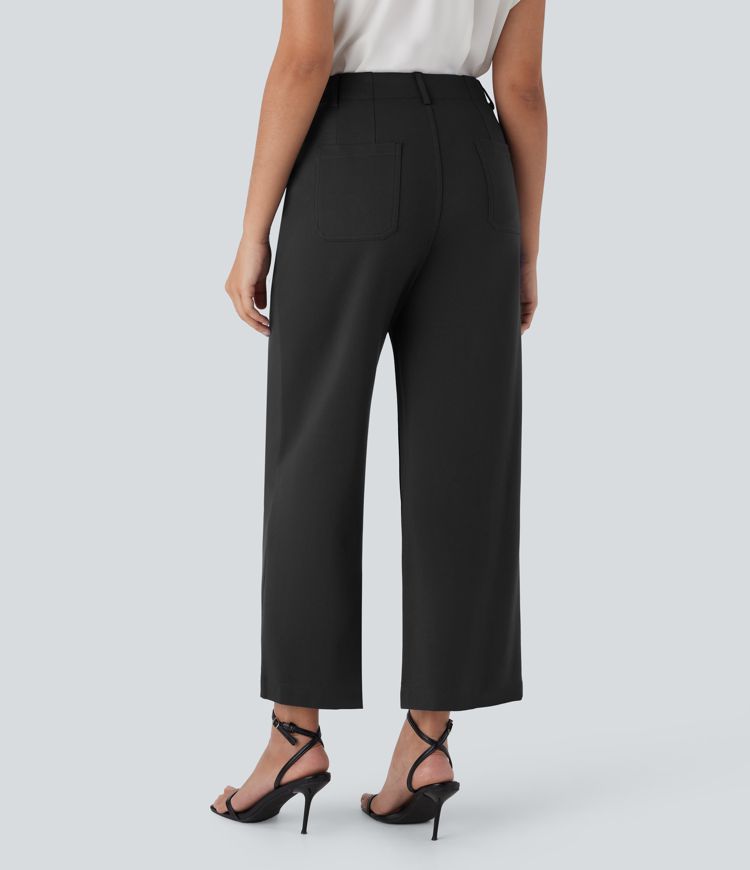 Stoffhose mit hohem Bund, mehreren Taschen, Knopf, Reißverschluss und weitem Bein