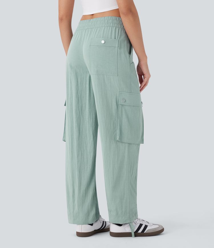 Pantalón cargo tiro medio múltiple bolsillo dobladillo cordón