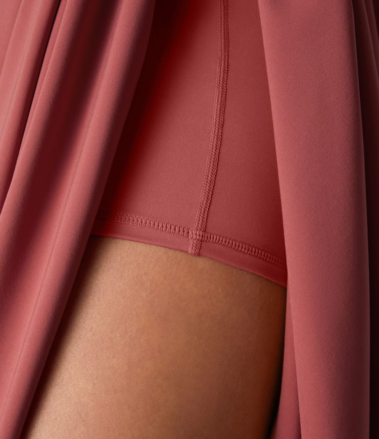 Falda midi Breezeful™ 2 en 1 fluida secado rápido bolsillo lateral trasero tiro alto