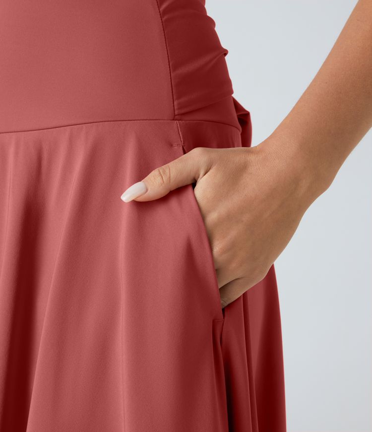 Falda midi Breezeful™ 2 en 1 fluida secado rápido bolsillo lateral trasero tiro alto